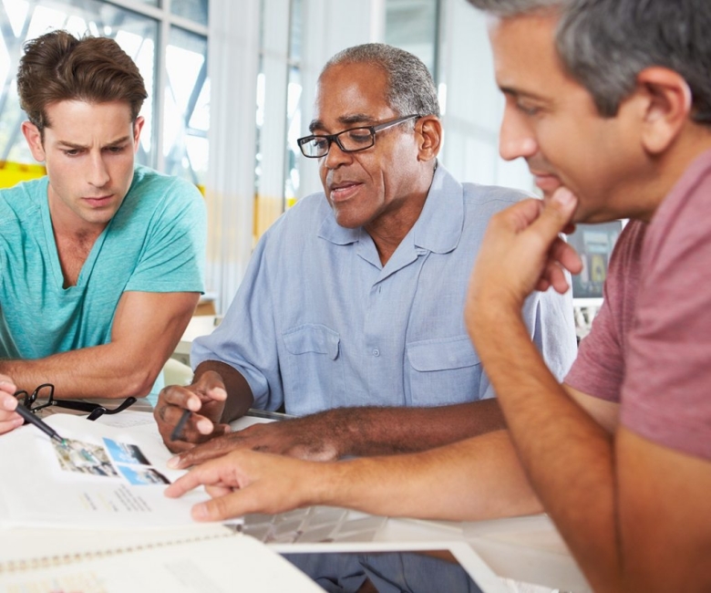 group-of-men-meeting-in-creative-office